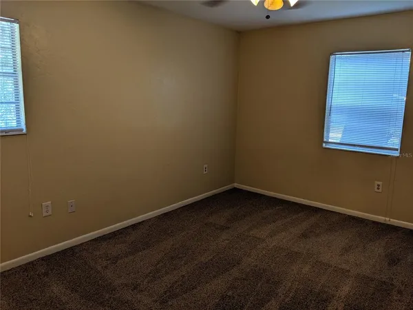 a bathroom with a toilet and a bathtub