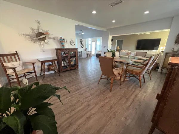 a view of a dining room with furniture