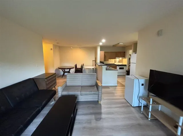 a room with a bed and a window