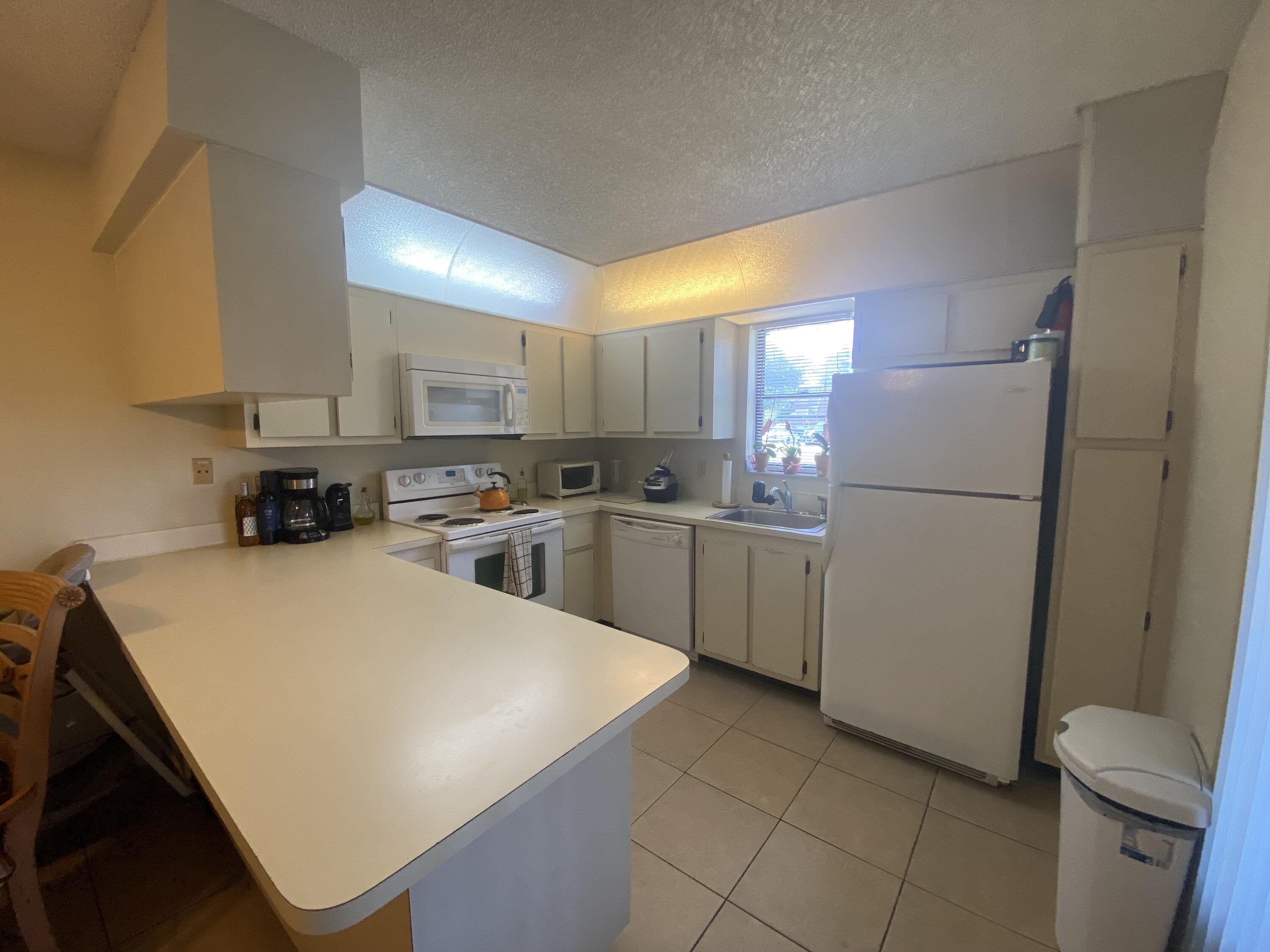 7715 Courtyard Run West Boca Raton, FL 33433 - Photo 2 of 13 Kitchen 1