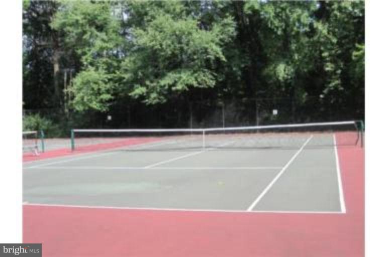 8013 Mandan Road, Unit 304 Greenbelt, MD 20770 - Photo 7 of 12 a view of a tennis court
