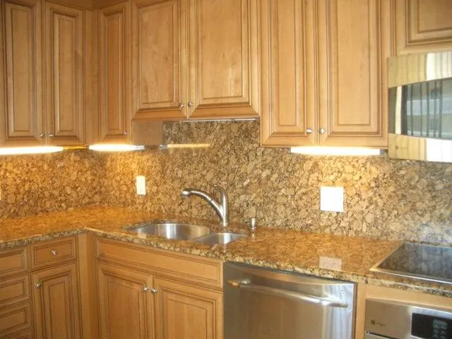 a view of a kitchen with a sink