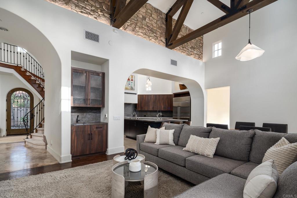 18596 Corte Fresco Rancho Santa Fe, CA 92091 - Photo 12 of 41 a living room with furniture and a fireplace