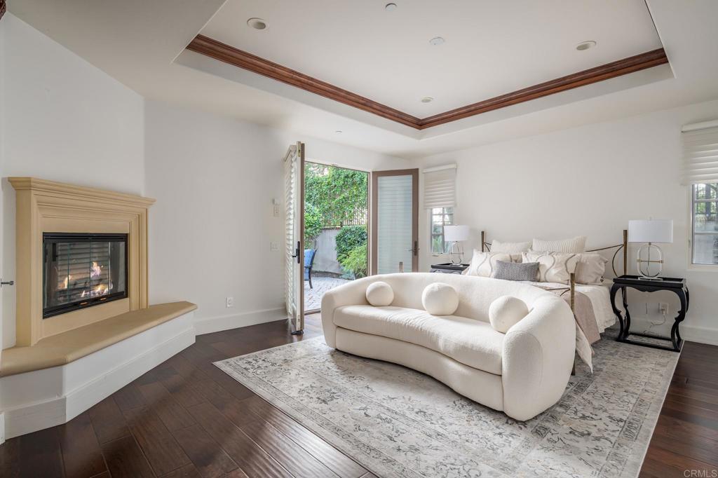 18596 Corte Fresco Rancho Santa Fe, CA 92091 - Photo 24 of 41 a living room with furniture and a fireplace