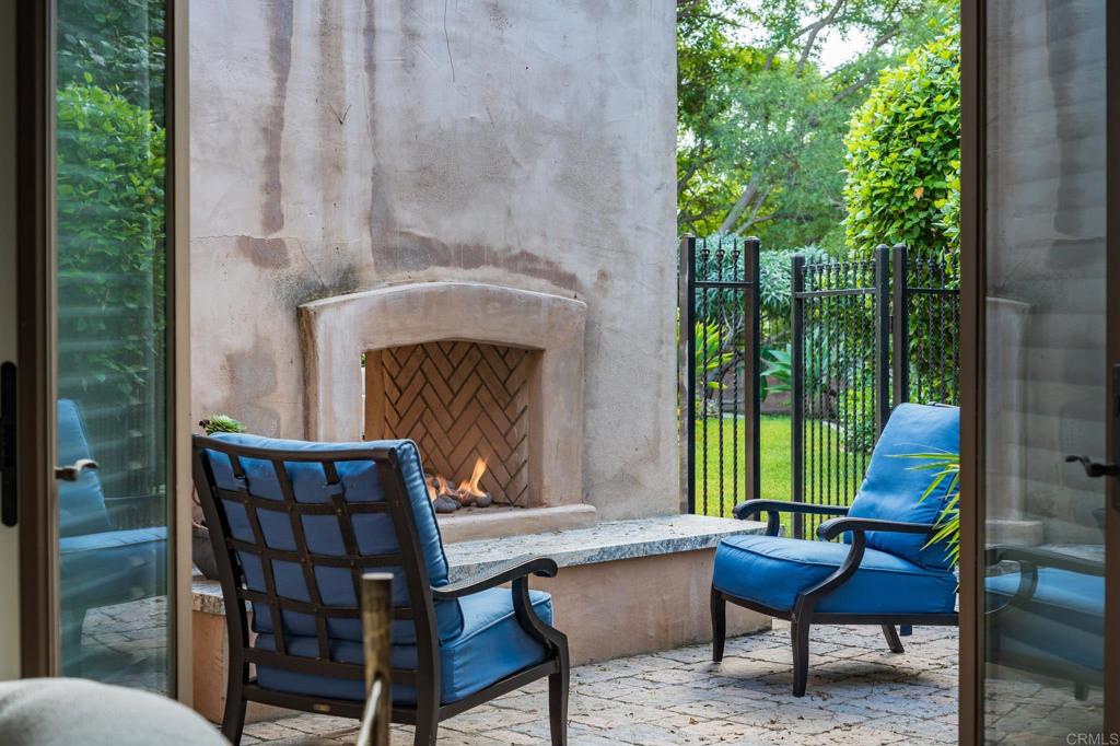18596 Corte Fresco Rancho Santa Fe, CA 92091 - Photo 26 of 41 a view of a chairs and table in the balcony