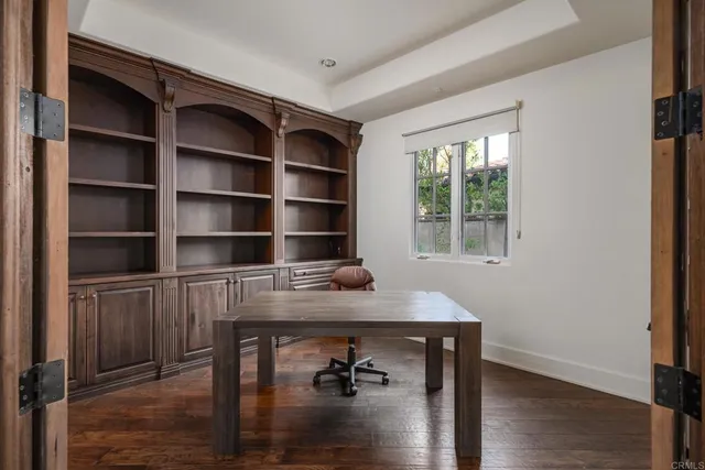 a workspace with furniture and window