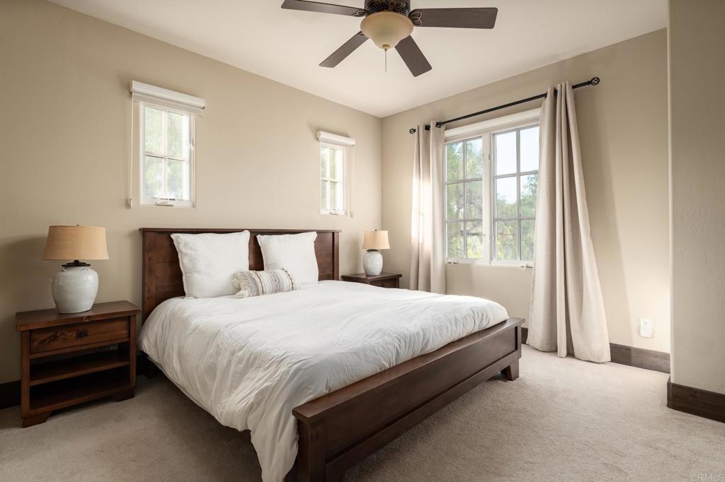 18596 Corte Fresco Rancho Santa Fe, CA 92091 - Photo 33 of 41 a bedroom with a bed and window