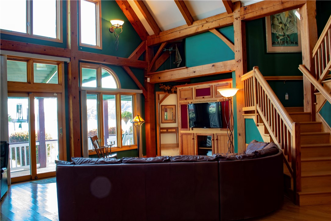 75D South Glenora Road Starkey, NY 14837 - Photo 15 of 38 Living Room looks out to Seneca Lake. The beams ar