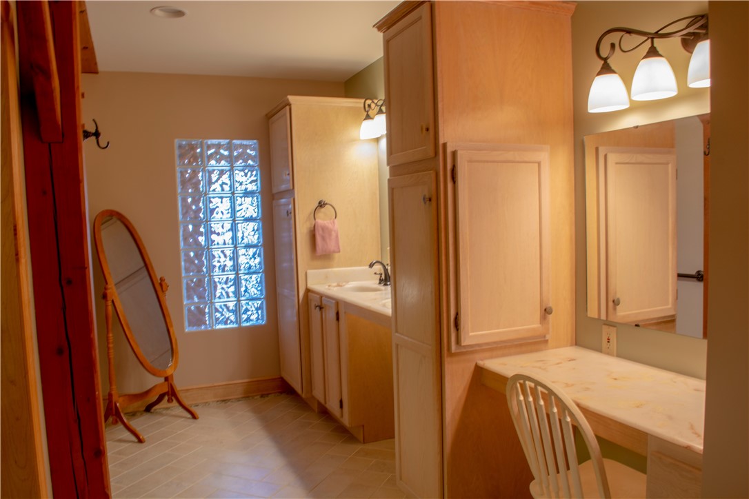 75D South Glenora Road Starkey, NY 14837 - Photo 26 of 38 The Owners Suite Dressing Area has two sinks and p