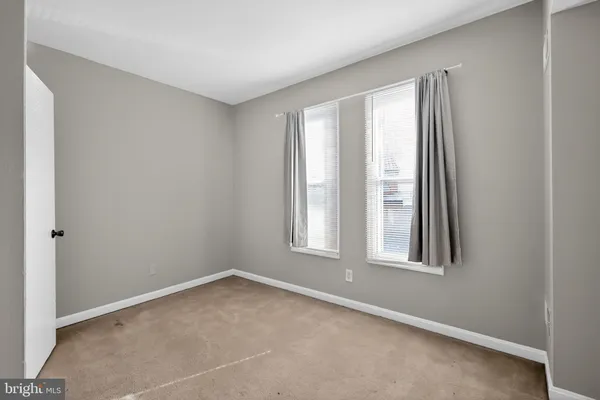 a view of an empty room with window