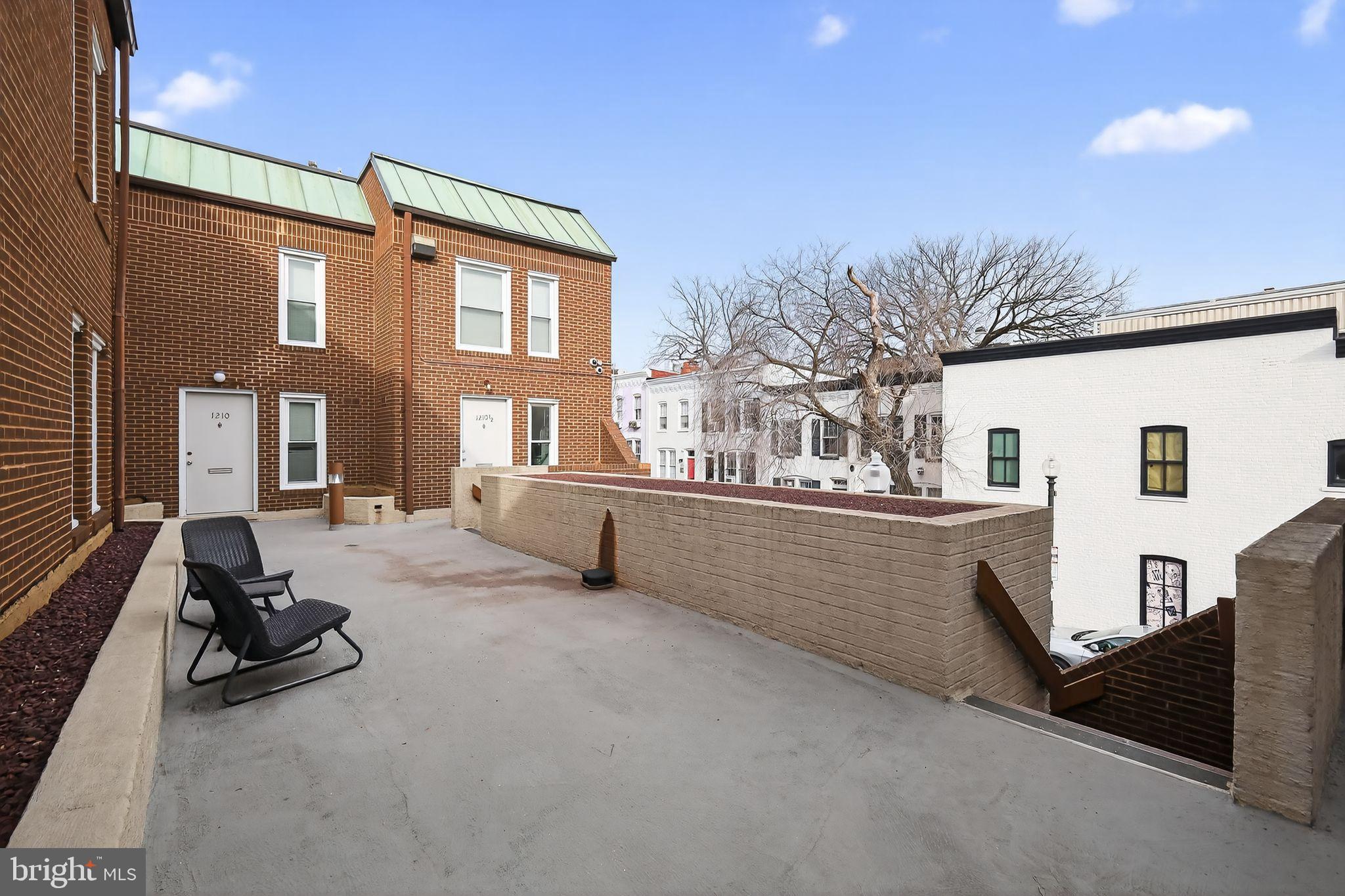 1204 1/2 33rd Street Northwest Washington, DC 20007 - Photo 3 of 20 Charming urban terrace with scenic views.