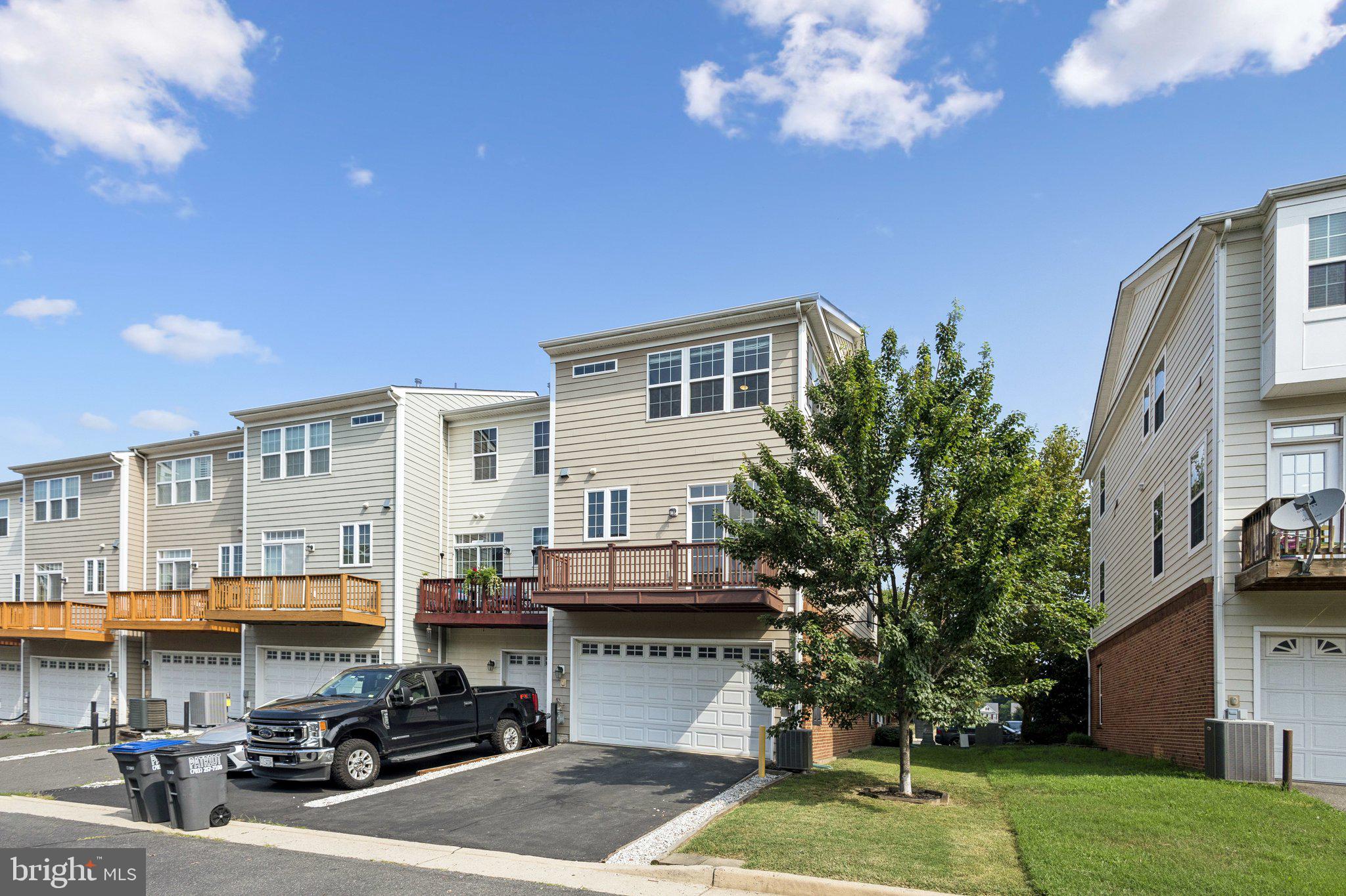 42761 Hay Road Ashburn, VA 20147 - Photo 21 of 46 a front view of building with yard
