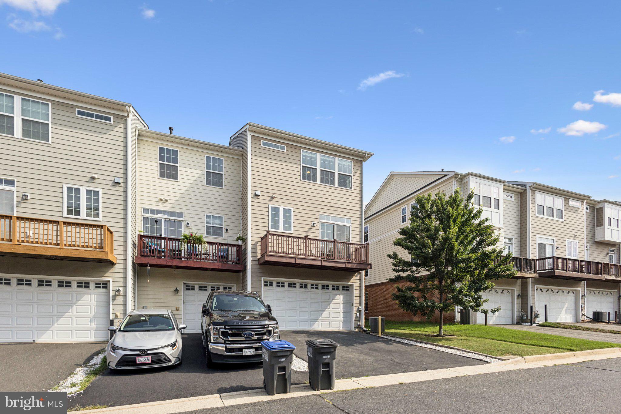 42761 Hay Road Ashburn, VA 20147 - Photo 22 of 46 a car parked in front of a house