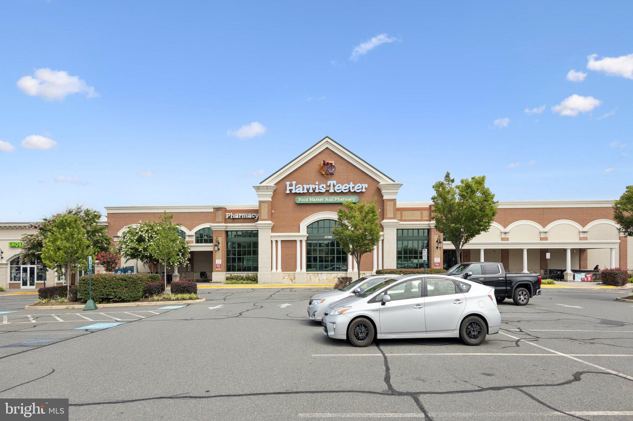 42761 Hay Road Ashburn, VA 20147 - Photo 28 of 46 a view of a cars park in front of a building