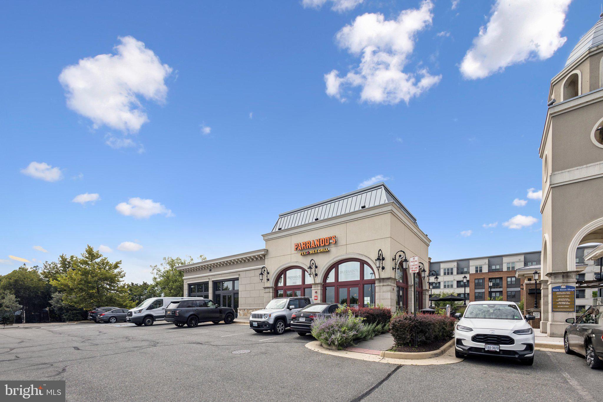 42761 Hay Road Ashburn, VA 20147 - Photo 33 of 46 a group of cars parked in front of a building