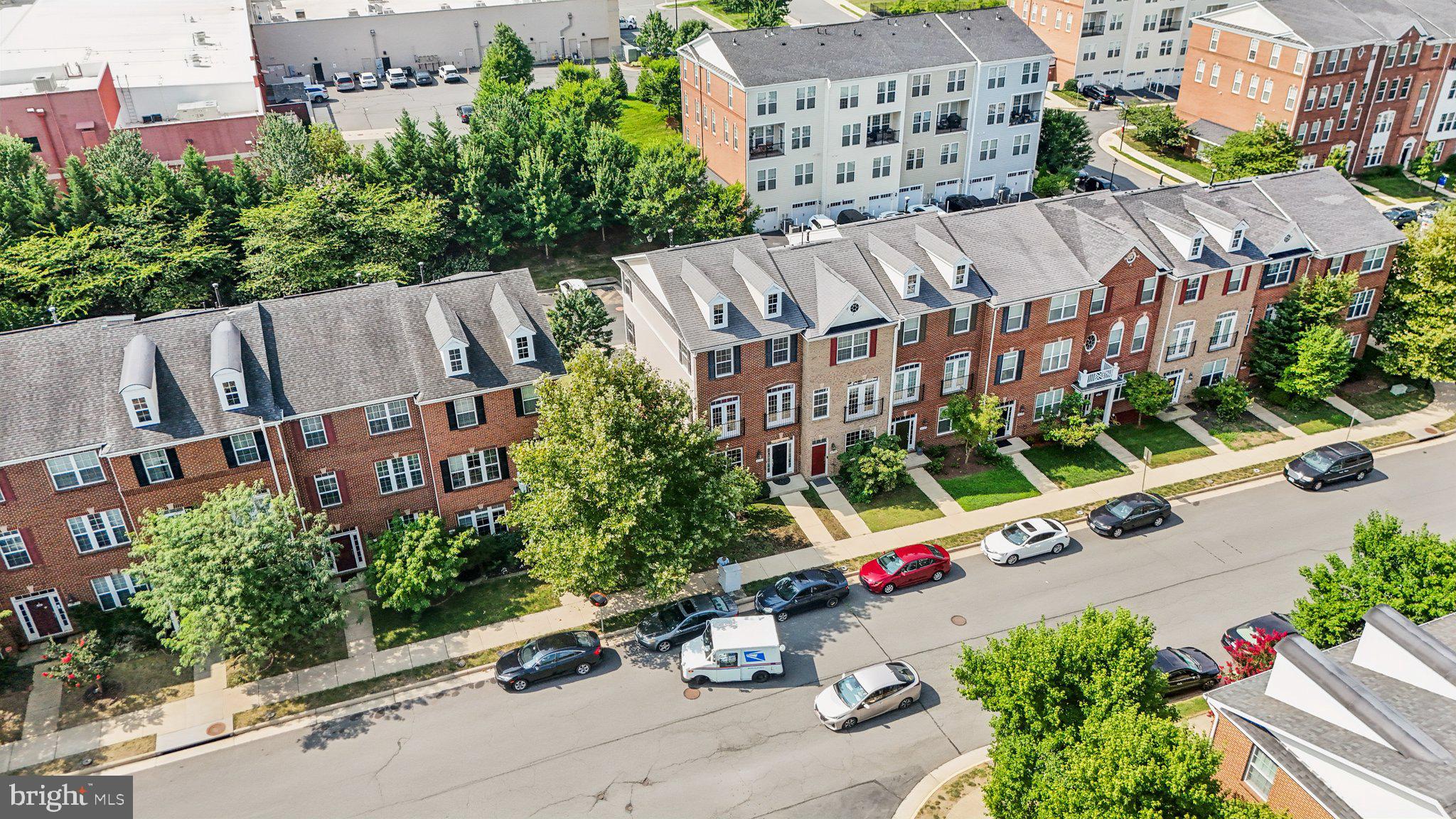 42761 Hay Road Ashburn, VA 20147 - Photo 40 of 46 an aerial view of multiple houses with a yard