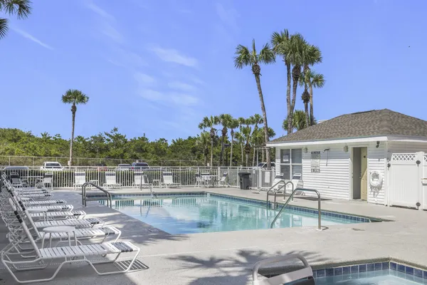 a view of a brick building next to a road