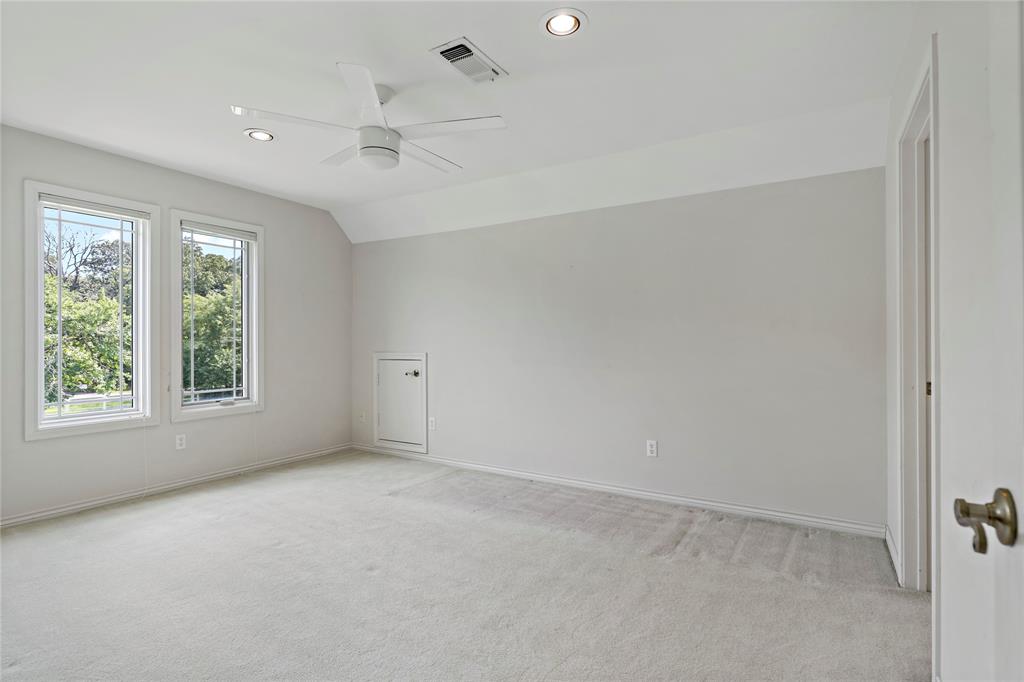 4905 Trails End Road Paris, TX 75462 - Photo 25 of 33 an empty room with windows and closet