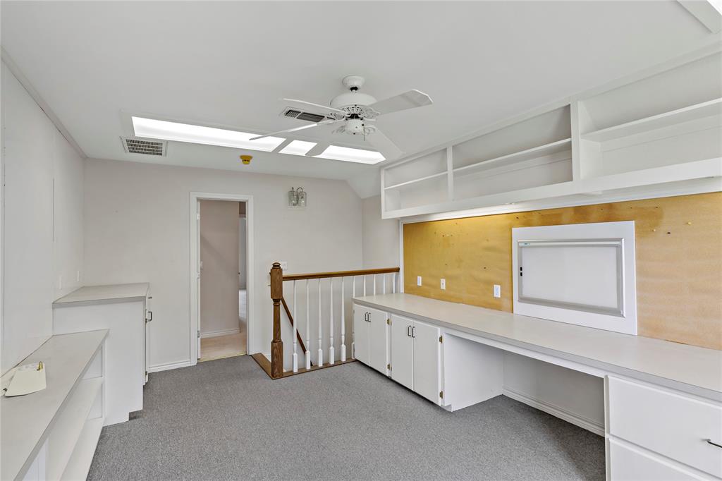 4905 Trails End Road Paris, TX 75462 - Photo 28 of 33 a spacious bathroom with a double vanity sink and a mirror