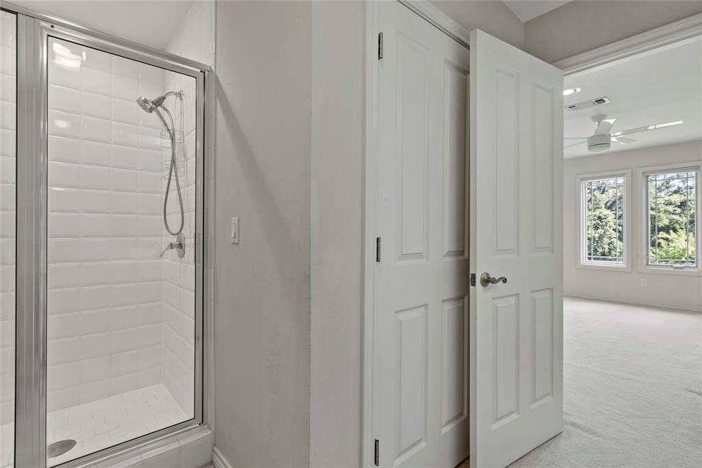 4905 Trails End Road Paris, TX 75462 - Photo 29 of 33 a bathroom with a glass shower door