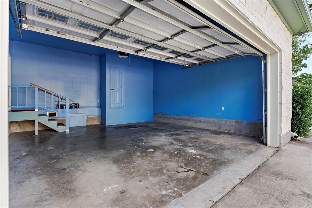 4905 Trails End Road Paris, TX 75462 - Photo 33 of 33 a view of a room with wooden walls and stairs