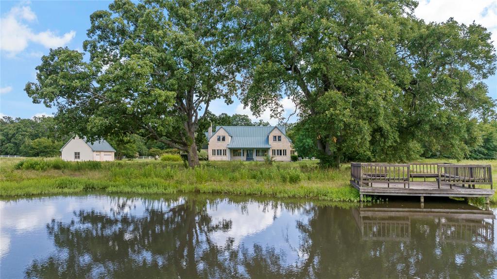 4905 Trails End Road Paris, TX 75462 - Photo 4 of 33 a view of house with swimming pool and a yard
