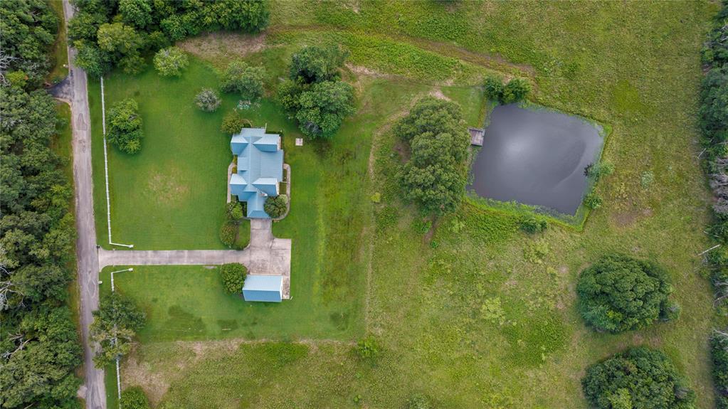 4905 Trails End Road Paris, TX 75462 - Photo 6 of 33 an aerial view of a house with a yard