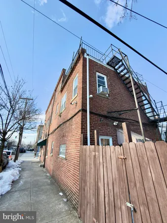a view of a house with a street