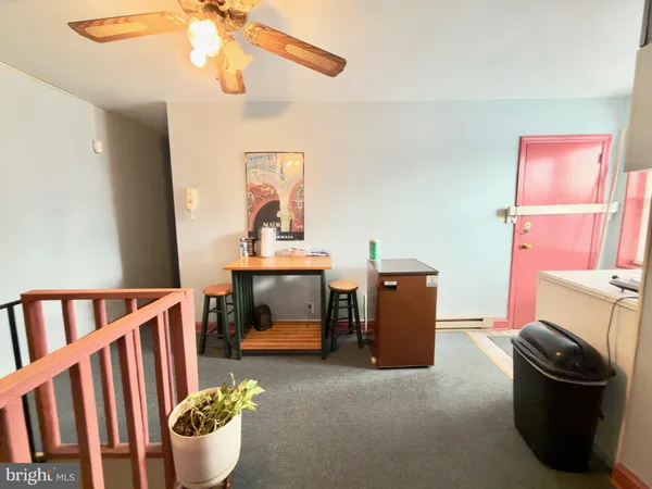 a room with furniture and a window