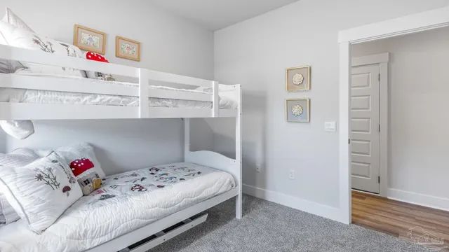 a bedroom with a bed and a closet