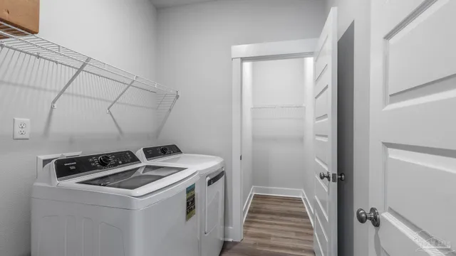 a utility room with dryer and washer