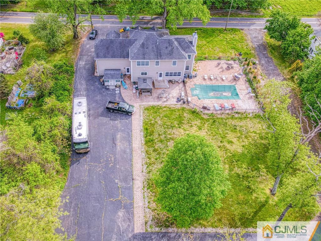 85 Davidson's Mill Road North Brunswick, NJ 08902 - Photo 8 of 39 an aerial view of a house with outdoor space
