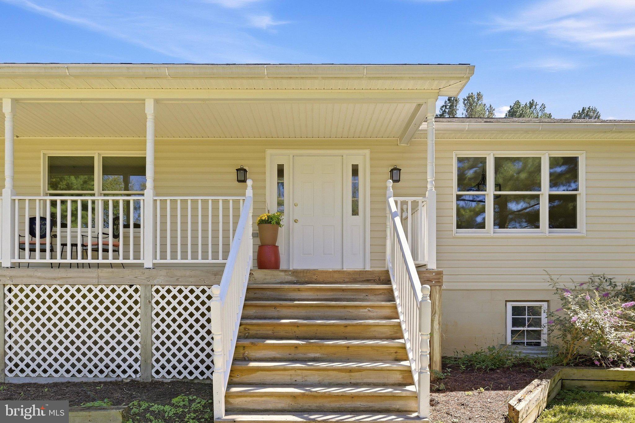 2983 Old Winchester Road Boyce, VA 22620 - Photo 5 of 98 Come up the steps to the comfortable front porch.