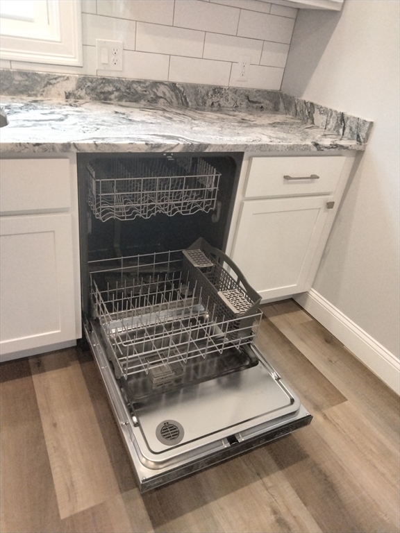 269 Brightman Street, Unit 2 Fall River, MA 02720 - Photo 8 of 12 a room with a washing machine