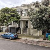 a car parked in front of a house