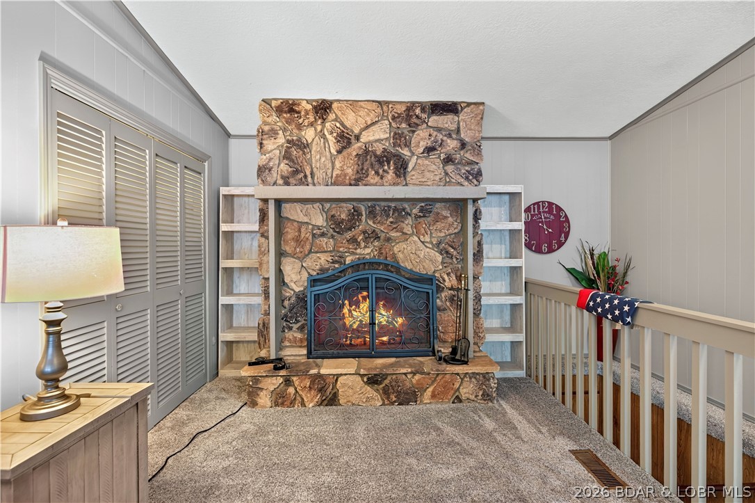 2084 Spring Cove Road Sunrise Beach, MO 65079 - Photo 11 of 63 Fireplace is wood burning