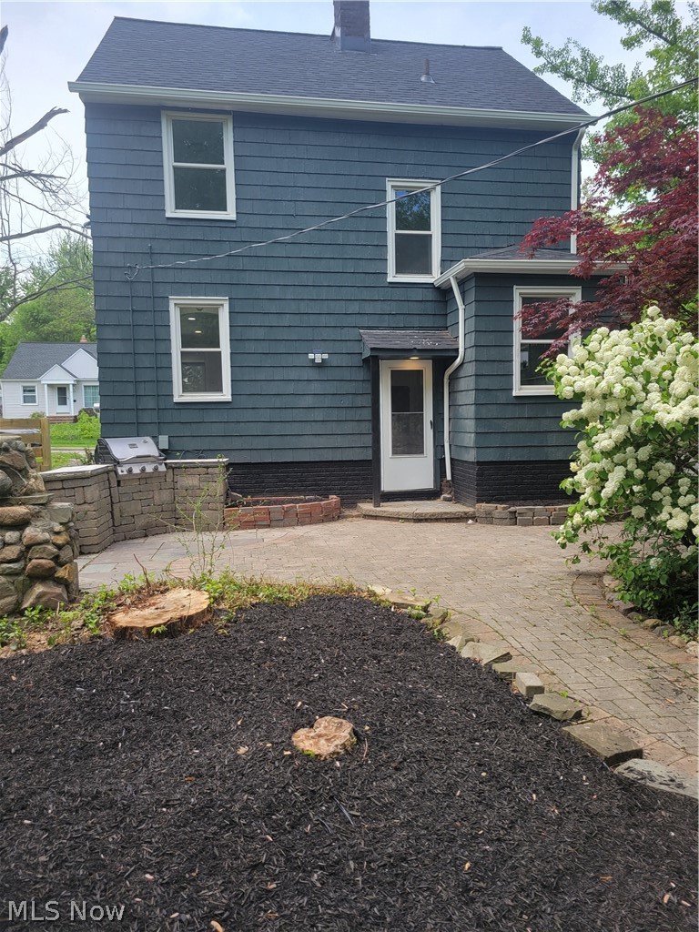 1557 Maplegrove Road South Euclid, OH 44121 - Photo 3 of 23 Back of house with a patio