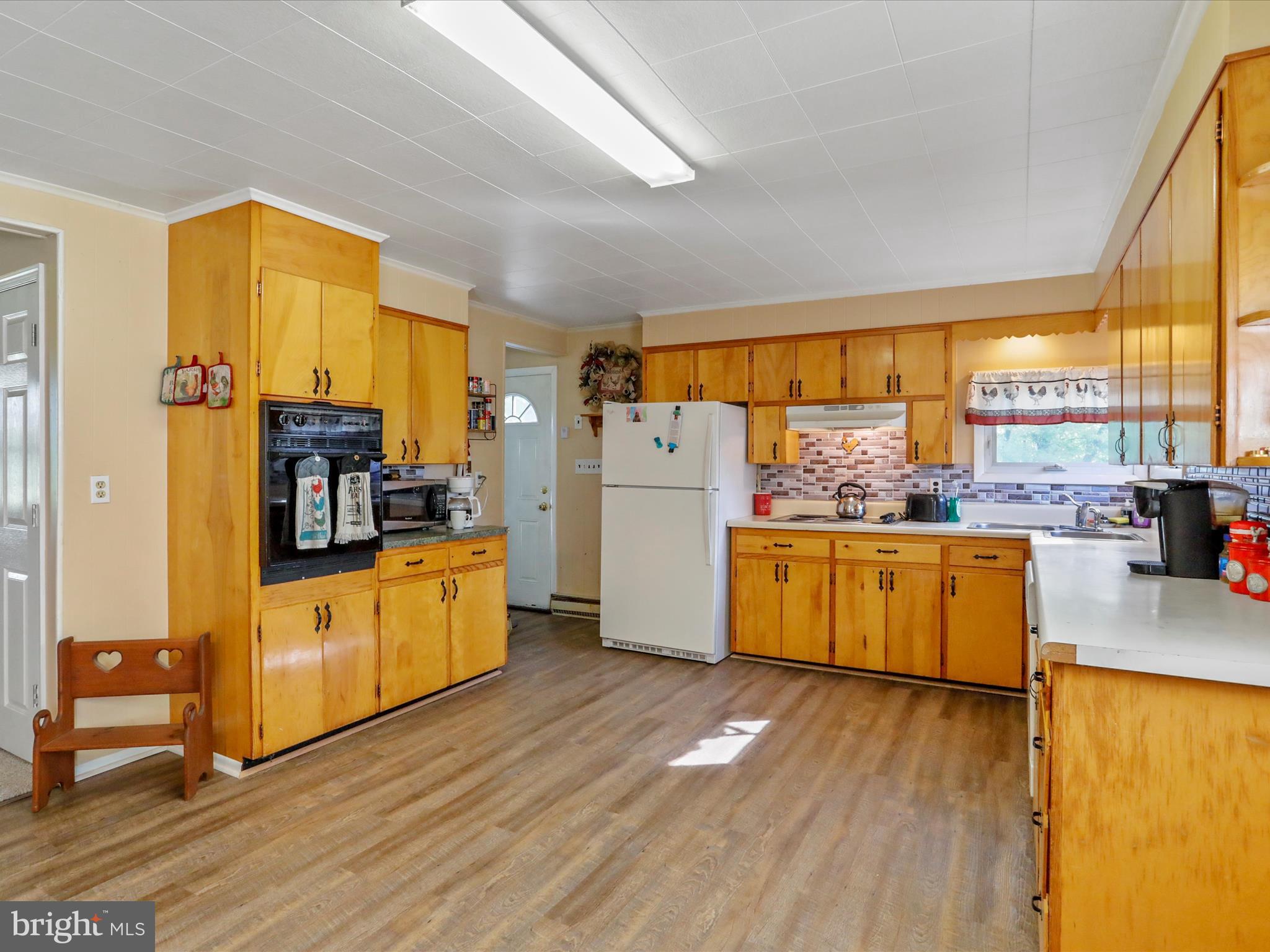 9276 Rabbit Road South Greencastle, PA 17225 - Photo 11 of 33 Kitchen has vinyl flooring for easy clean up!