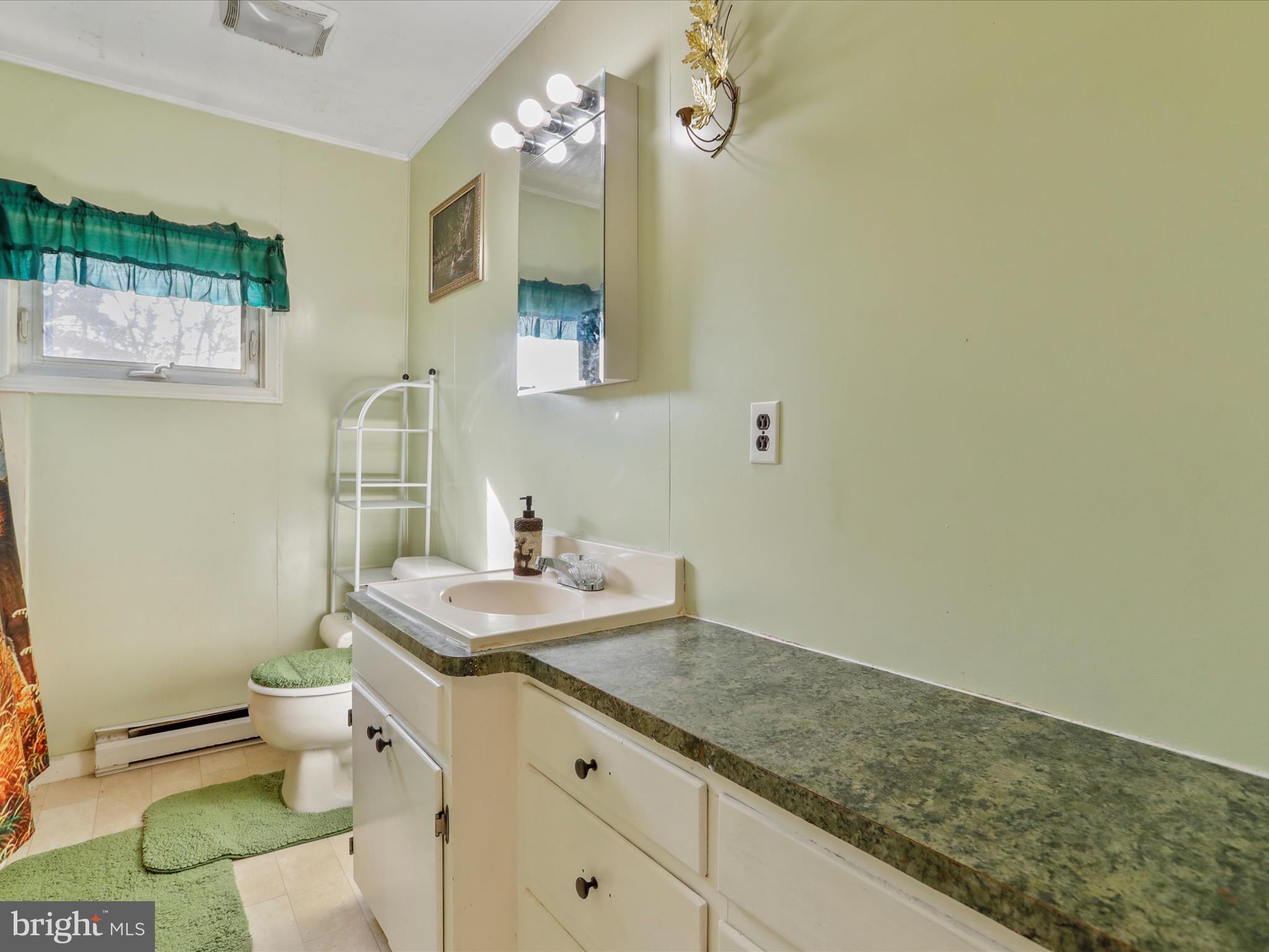 9276 Rabbit Road South Greencastle, PA 17225 - Photo 15 of 33 Main bath has tub/shower and lots of counterspace!