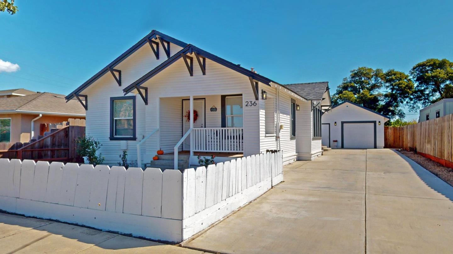236 West Street Soledad, CA 93960 - Photo 2 of 41 a front view of a house with a yard