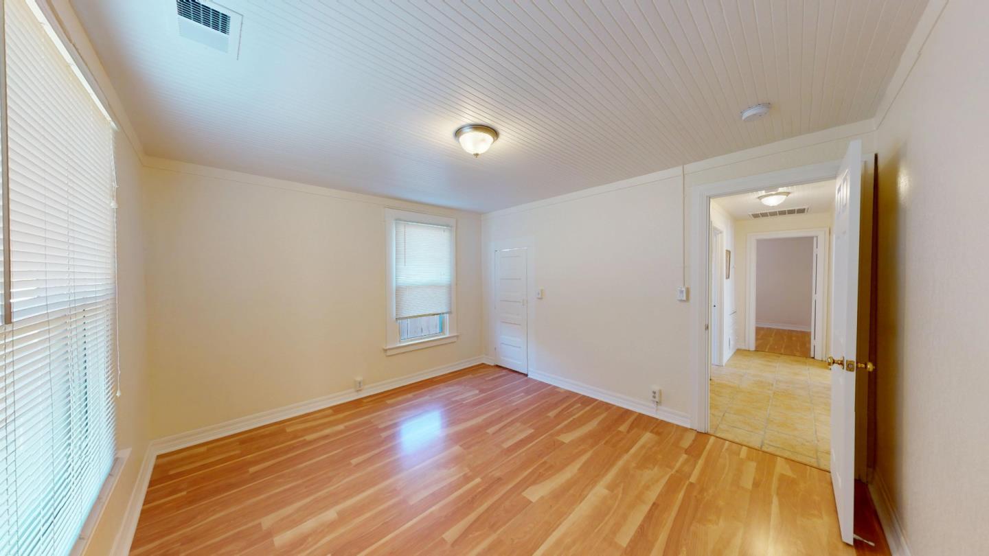 236 West Street Soledad, CA 93960 - Photo 23 of 41 wooden floor in an empty room with a window