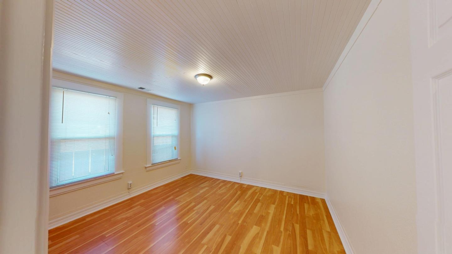 236 West Street Soledad, CA 93960 - Photo 25 of 41 a view of empty room with wooden floor