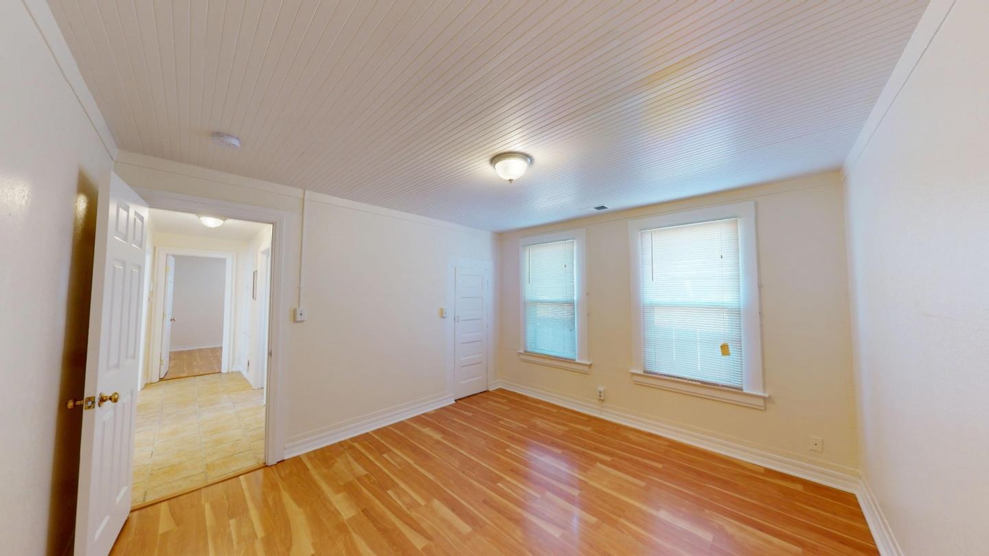 236 West Street Soledad, CA 93960 - Photo 26 of 41 a view of a room with wooden floor and windows