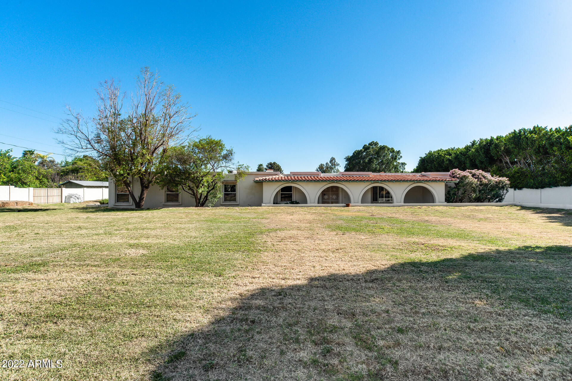 5501 East Camelback Road Phoenix, AZ 85018 - Photo 2 of 53 a view of a house with a yard