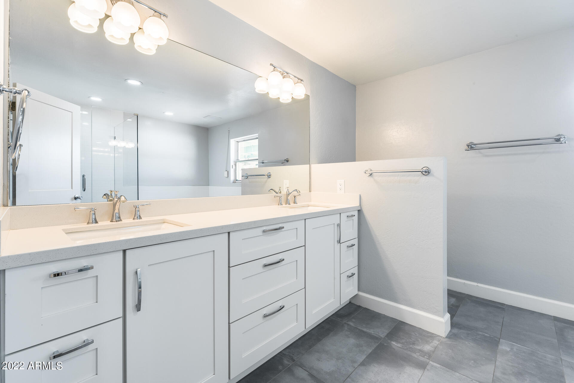 5501 East Camelback Road Phoenix, AZ 85018 - Photo 37 of 53 a spacious bathroom with a double vanity sink mirror and
