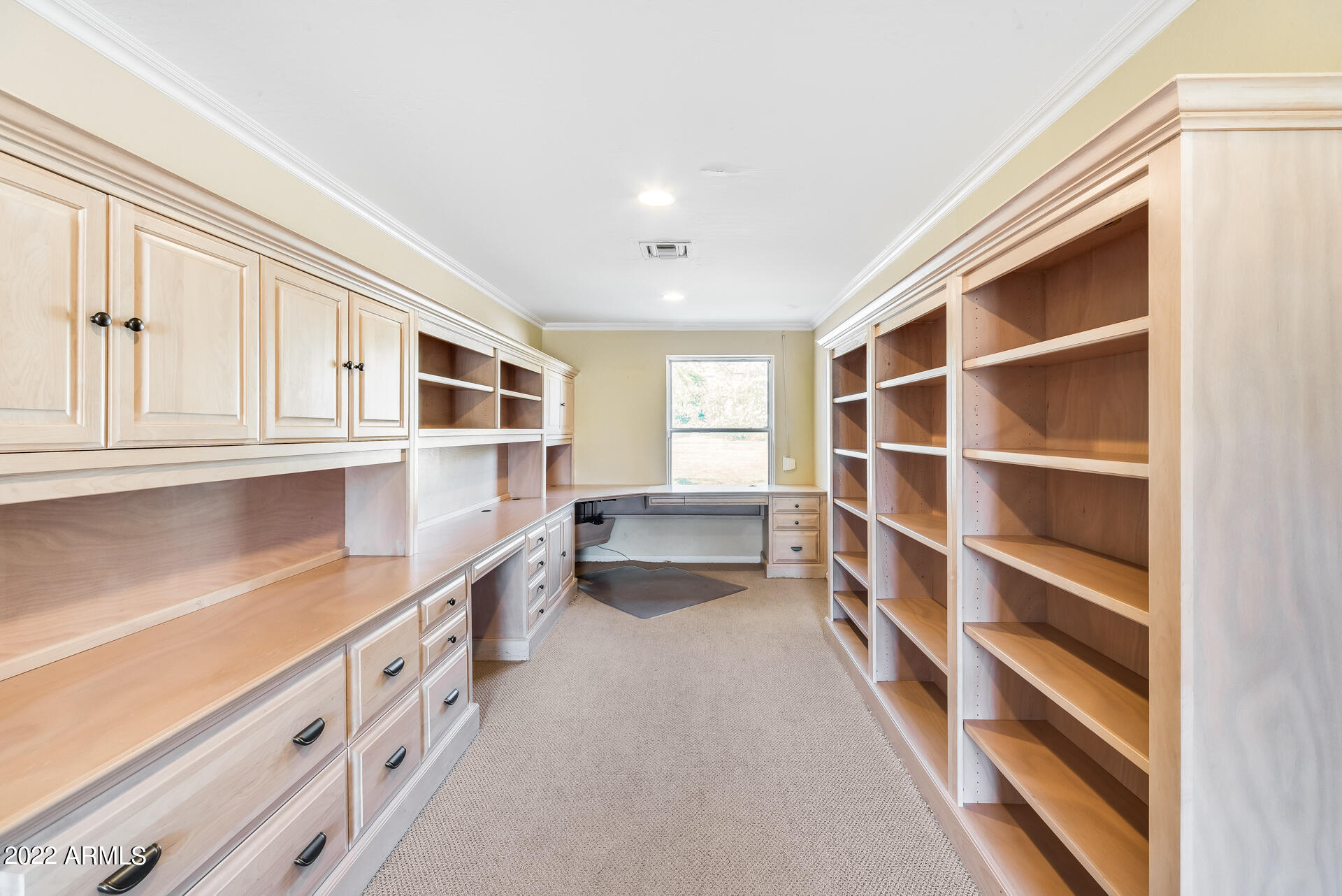 5501 East Camelback Road Phoenix, AZ 85018 - Photo 42 of 53 a kitchen with stainless steel appliances cabinets and a window