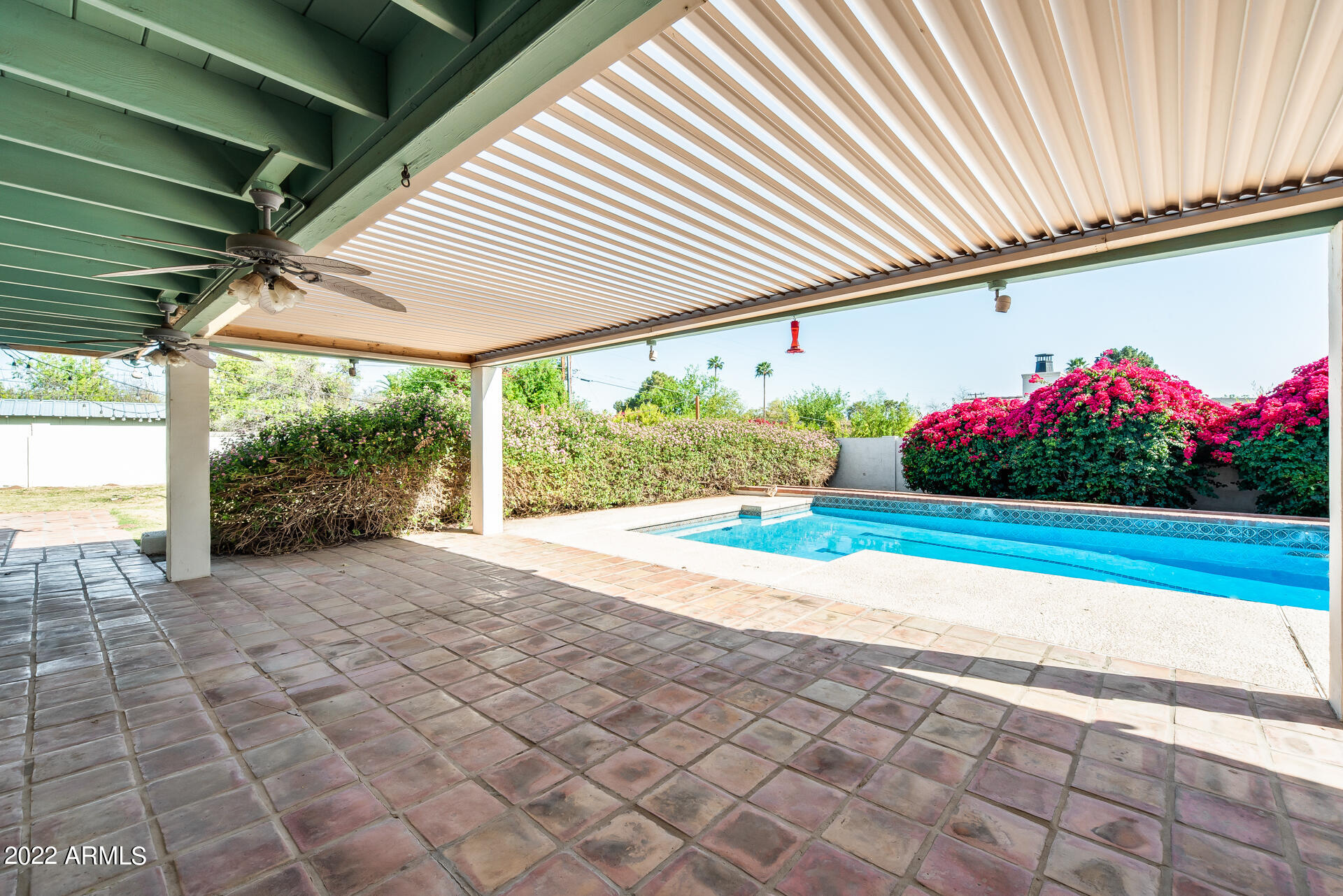 5501 East Camelback Road Phoenix, AZ 85018 - Photo 43 of 53 a view of a porch and garden