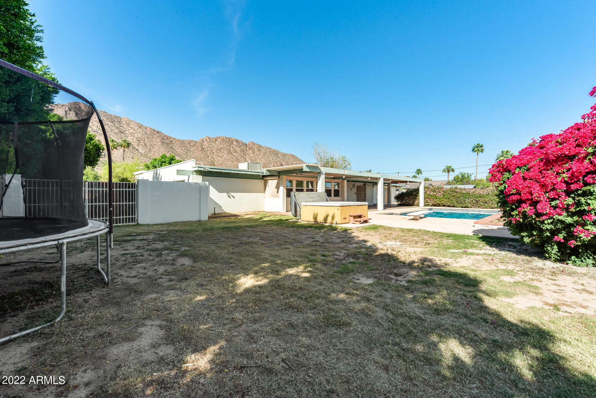 5501 East Camelback Road Phoenix, AZ 85018 - Photo 46 of 53 a view of a house with a yard