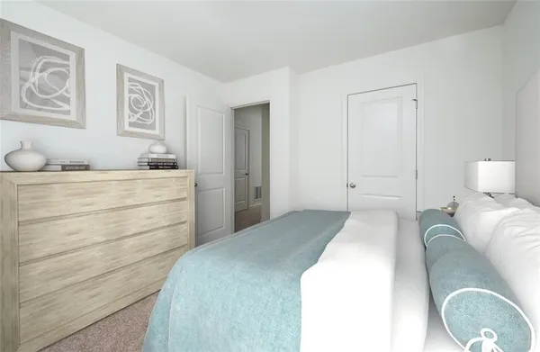 a bedroom with a bed and cabinet