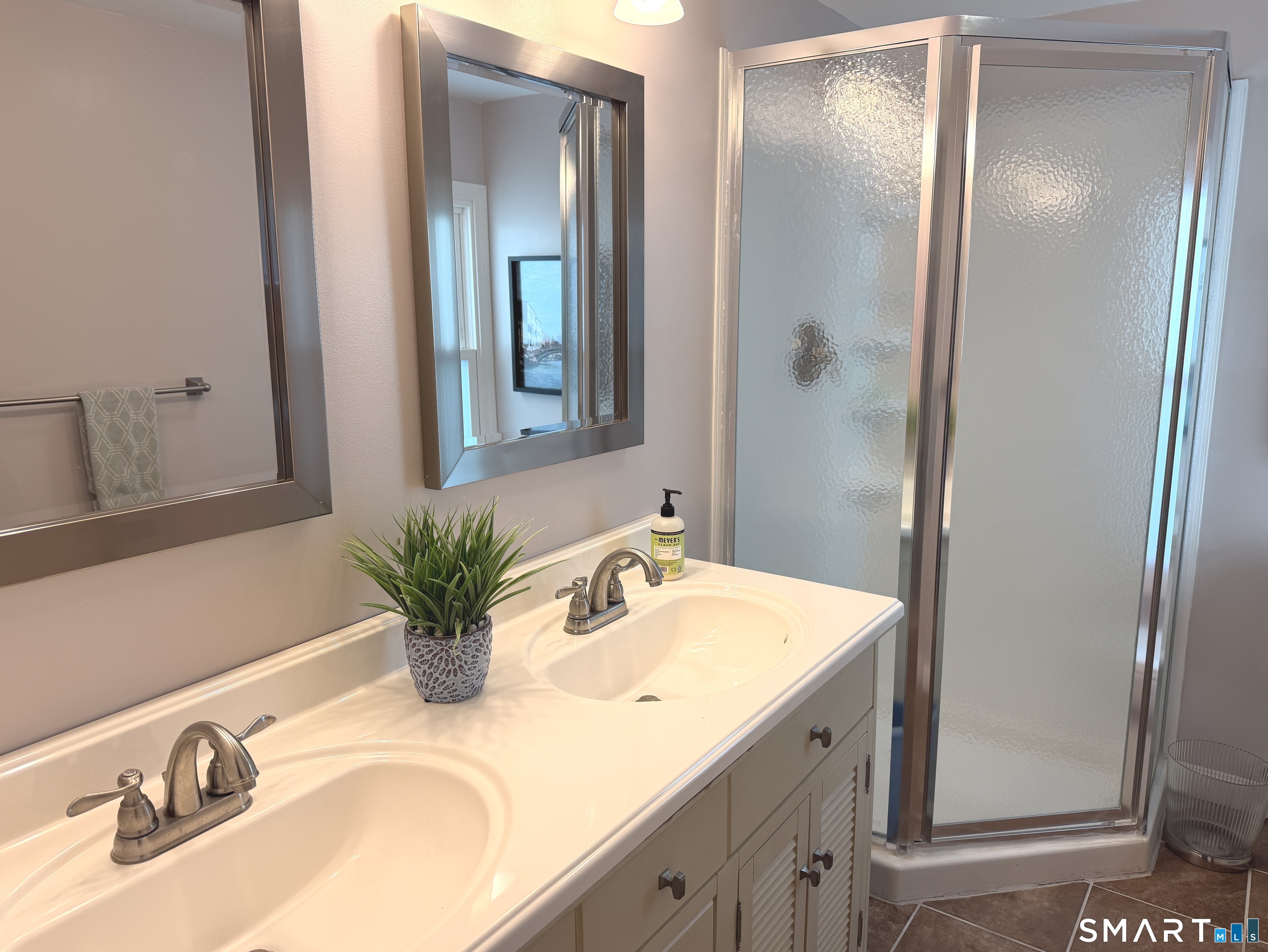 31 Old Colony Road Old Lyme, CT 06371 - Photo 23 of 38 a bathroom with a sink and a mirror